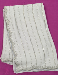 AFL3046 Partywear georgette saree in gray with silver sequin and embroidery work.Comes with stitched blouse size 40,can be altered to 44 size.Fall peco done.