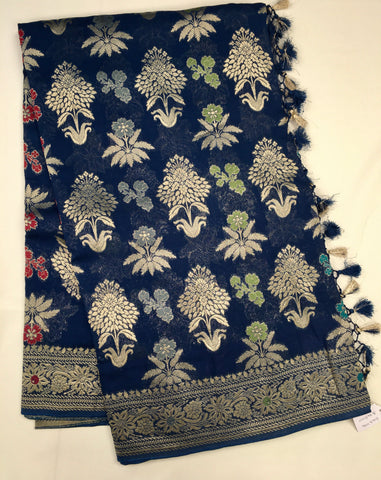 BKS104 Banarasi Georgette saree in blue. Comes with stitched blouse size 38 can be altered to size 42. Fall peco done.