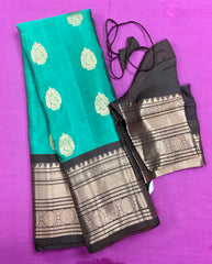 KSS454 Pure handloom kanchipuram silk Saree in green with brown gold zari border.comes with stitched blouse size 40,can be altered to 44 size.