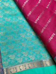 KSS419 kanchipuram silk Saree in red and green border.comes with stitched blouse size 40,can be altered to 44 size.Fall peco don.
