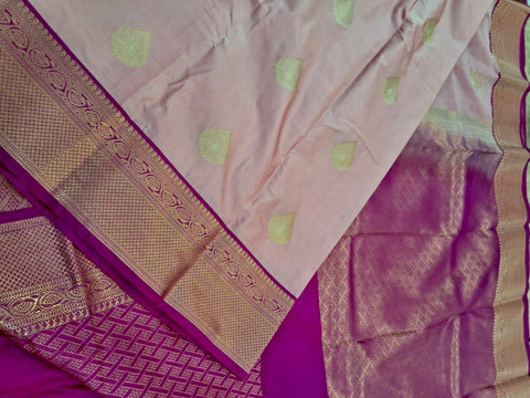 KSS336 Kanjivaram Semi Silk Saree In Light Pink w/ Dark Pink Border. Fall Peco done. Comes w/ stitched blouse size: 38 to 46.