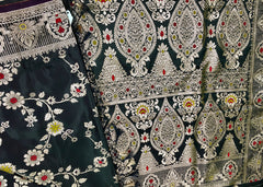 BKS132 Banarasi Mashru silk Saree in black. Comes with gold  zari work. Comes with stitched blouse size 38 can be altered to size 42. Fall peco done.