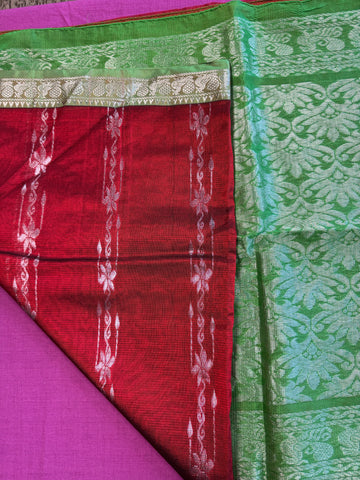 Banarasi Tussari saree in Red with Green  border.Fall peco done. Comes with stitched blouse size 38 can be altered up to 44 size.