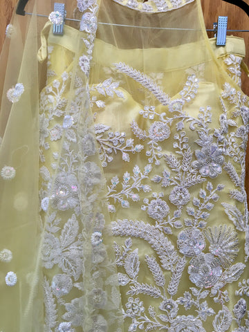 AFL2034-Party wear set in yellow with heavy embroidery work.Come with sharara pant and dupatta.
