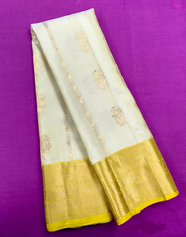 KSS456 Pure handloom kanchipuram silk Saree in sandal yellow with yellow gold zari border.comes with stitched blouse size 40,can be altered to 44 size.