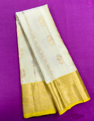 KSS456 Pure handloom kanchipuram silk Saree in sandal yellow with yellow gold zari border.comes with stitched blouse size 40,can be altered to 44 size.