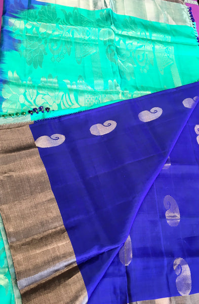 Pure kanchipuram Handloom Soft  Silk Saree in Blue with green  Zari border. Comess with Stitched Blouse size 38 can be altered up to 44