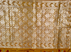 BKS119 Banarasi Mashru silk Saree in yellow. Comes with gold zari work. Comes with stitched blouse size 38 can be altered to size 42. Fall peco done.