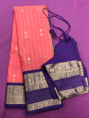 KSS430 Pure handloom kanchipuram silk Saree in pink with purple gold zari border.comes with stitched blouse size 40,can be altered to 44 size.