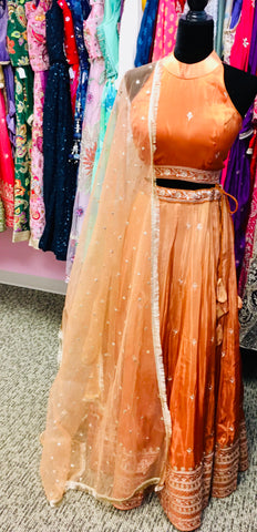 AFL9033 lehenga in orange . Comes with matching stitched blouse and dupatta.