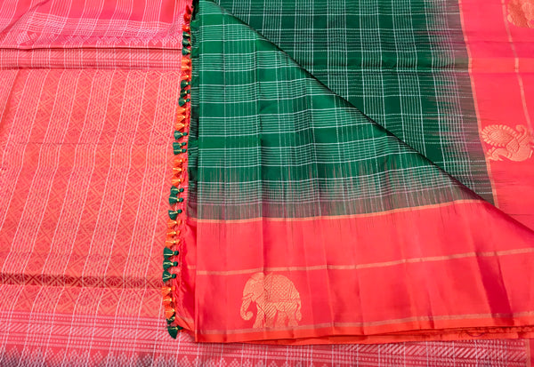 KSS401 Pure handloom kanchipuram silk Saree in green with red gold zari border.comes with stitched blouse size 40,can be altered to 44 size.