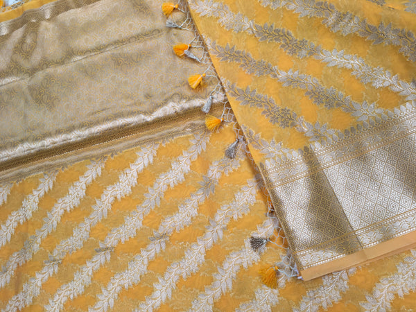 BKS138 Cotton Banarasi Saree in yellow. Comes with stitched blouse size 38 can be altered to size 42. Fall peco done.