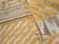BKS138 Cotton Banarasi Saree in yellow. Comes with stitched blouse size 38 can be altered to size 42. Fall peco done.