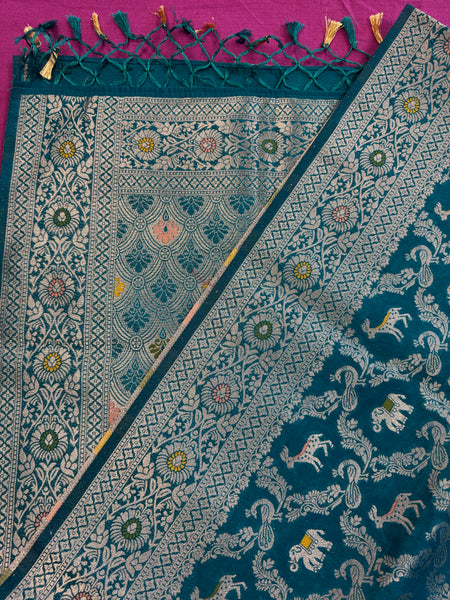 semi silk banarasi Saree in Blue with Zari Border. Comess with stitched blouse size 38 can be altered up to 44