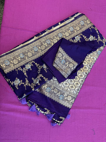 Banarasi Tussari georgette saree in Blue with gold and silver zari border.Fall peco done. Comess with stitched blouse size 38 can be altered up to 44 size.