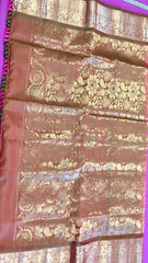 Pure kanchipuram Handloom Silk Saree in pink with Brown Zari border. Comes with Stitched Blouse size 38 can be altered up to 44