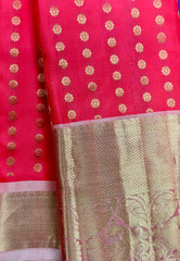 KSS455 Pure handloom kanchipuram silk Saree in red with light pink gold zari border.comes with stitched blouse size 40,can be altered to 44 size.