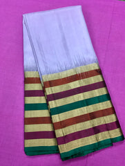 KSS414 Pure handloom kanchipuram silk Saree in purple with multi color gold zari border. Comes with stitched blouse size 40