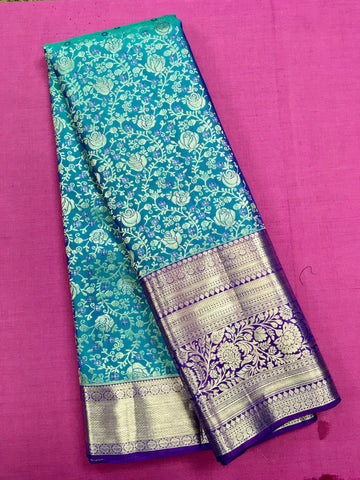 KSS451 Pure kanchipuram silk Saree in blue with purple border gold zari work.comes with stitched blouse size 40,can be altered to 44 size.