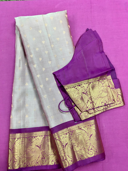 KSS441 Pure handloom kanchipuram silk Saree in pink with purple gold zari border.comes with stitched blouse size 40,can be altered to 44 size.
