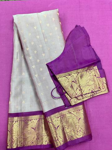 KSS441 Pure handloom kanchipuram silk Saree in pink with purple gold zari border.comes with stitched blouse size 40,can be altered to 44 size.