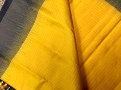 KSS406 Pure handloom kanchipuram silk Saree in yellow with black gold zari border.comes with stitched blouse size 40,can be altered to 44 size.