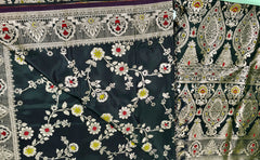 BKS132 Banarasi Mashru silk Saree in black. Comes with gold  zari work. Comes with stitched blouse size 38 can be altered to size 42. Fall peco done.