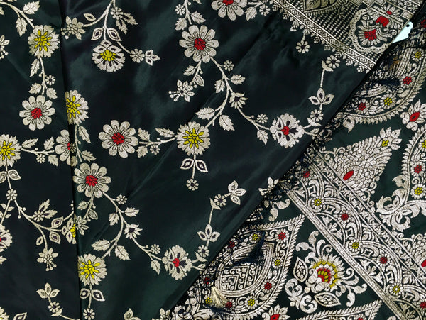 BKS132 Banarasi Mashru silk Saree in black. Comes with gold  zari work. Comes with stitched blouse size 38 can be altered to size 42. Fall peco done.
