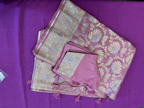 Banarasi Tussari georgette saree in Onion Pink with gold and silver zari border.Fall peco done. Comess with stitched blouse size 38 can be altered up to 44 size.