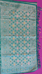 semi silk banarasi Saree in Green with Zari Border. Comes with stitched blouse size 38 can be altered up to 44