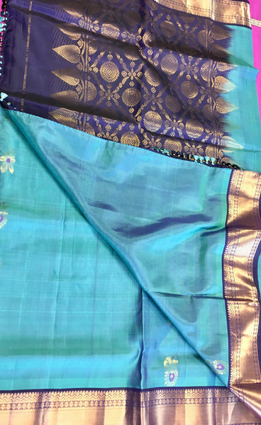 Pure kanchipuram Handloom Silk Saree in Blue with Dark Blue Zari border. Comess with Stitched Blouse size 38 can be altered up to 44