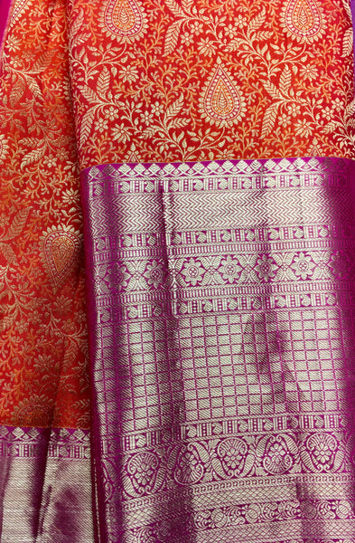 KSS432 Pure kanchipuram tissue silk Saree in orange with pink gold zari border . Comes with stitched blouse size 40,