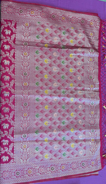 semi silk banarasi Saree in rani Pink with Zari Border. Comes with stitched blouse size 38 can be altered up to 44
