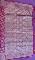 semi silk banarasi Saree in rani Pink with Zari Border. Comess with stitched blouse size 38 can be altered up to 44
