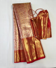 KSS510 Pure kanchipuram tissue silk Saree in orange with gold zari work.comes with stitched blouse size 40,can be altered to 44 size.