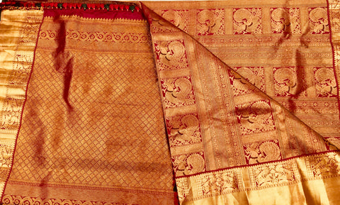 KSS501 Pure kanchipuram handloom silk Saree in red color with gold zari border. comes with stitched blouse size 40,can be altered to 44 size.