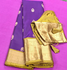 KSS421 Pure kanchipuram silk Saree in purple and green Zari border.comes with stitched blouse size 40,can be altered to 44 size.Fall peco done.