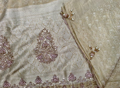 AFL8003 Pure banarasi crepe tissue saree in beige with heavy hand embroidery party wear Saree.comes with stitched blouse size 38 can be altered to 44 size.
