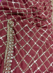 AFL3066 Partywear Saree in brown Georgette fabric with silver sequins embroidery.Comes with stitched blouse size 40,can be altered to 44 size.Fall peco done.