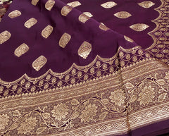 BKS127 Banarasi Mashru silk Saree in brown. Comes with gold zari work. Comes with stitched blouse size 38 can be altered to size 42. Fall peco done.