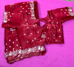 AFL3055 Partywear saree in maroon with silver embroidery.Comes with stitched blouse size 40,can be altered to 44 size.Fall peco done.