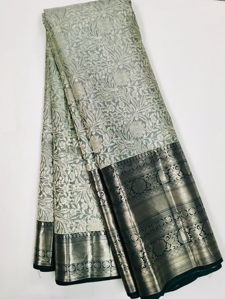 KSS514 Pure kanchipuram tissue silk Saree in gray with  bottle green color gold zari border. comes with stitched blouse size 40,can be altered to 44 size.