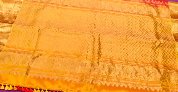 KSS410 Pure handloom kanchipuram silk Saree in Orange with yellow gold zari border. Comes with stitched blouse size 40