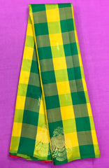 KSS427 Pure handloom kanchipuram silk Saree in green and yellow checkered with gold zari.comes with stitched blouse size 40,can be altered to 44 size.
