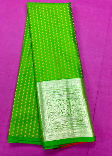 KSS402 Pure handloom kanchipuram silk Saree in green with gold and silver zari border.comes with stitched blouse size 40,can be altered to 44 size.