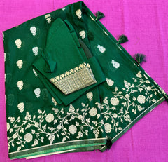 semi silk banarasi Saree in Bottle Green with Gold Zari Border.Fall peco done. Comess  with stitched blouse size 38 can be altered up to 44