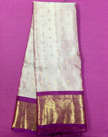 KSS441 Pure handloom kanchipuram silk Saree in pink with purple gold zari border.comes with stitched blouse size 40,can be altered to 44 size.