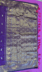 Banarasi silk  saree in purple  with Gold Zari border. Fall peco done. Comes with stitched blouse size 38 can be altered up to 44 size.