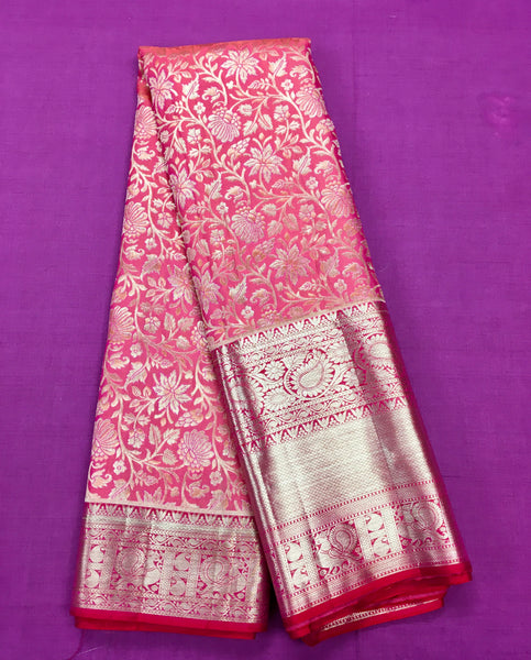 KSS409 Pure kanchipuram silk Saree in pink with gold zari border.comes with stitched blouse size 40,can be altered to 44 size.