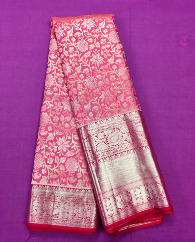 KSS409 Pure kanchipuram silk Saree in pink with gold zari border.comes with stitched blouse size 40,can be altered to 44 size.